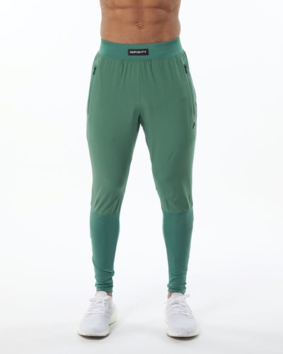 Luxury Green Alphalete Woven 4-Way Stretch 29" Pant | 20367-WURY