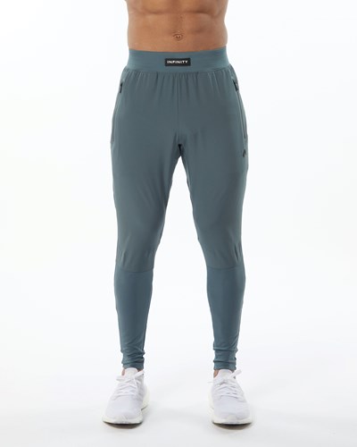 Porcelain Grey Alphalete Woven 4-Way Stretch 29" Pant | 18054-RDSO