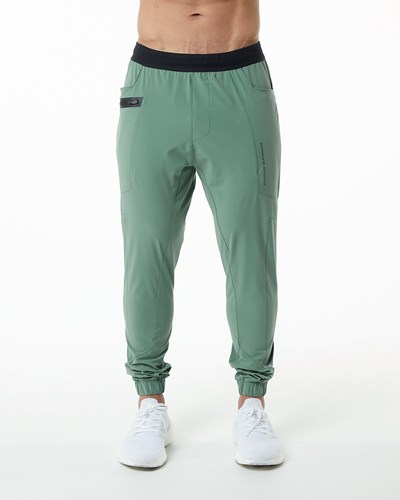 Sage Green Alphalete Woven 4-Way Stretch 29" Pant | 50174-RTZX