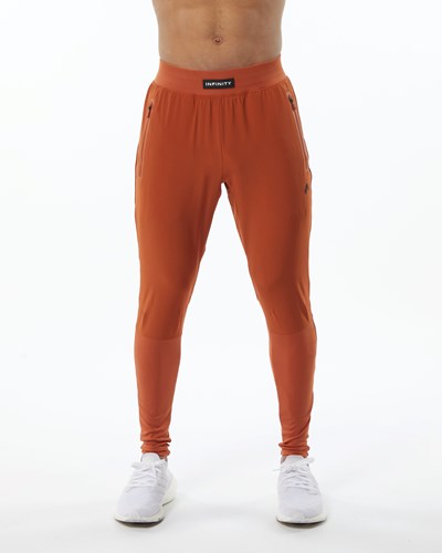 Sour Tangerine Alphalete Woven 4-Way Stretch 29" Pant | 75983-JGYO