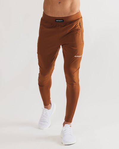 Spice Alphalete Woven 4-Way Stretch 29" Pant | 08526-ITCQ