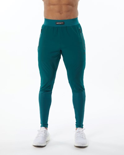 Velvet Teal Alphalete Woven 4-Way Stretch 29" Pant | 07294-GTPO